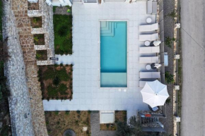 Villa Mareli - Beachside Villa with Heated Pool